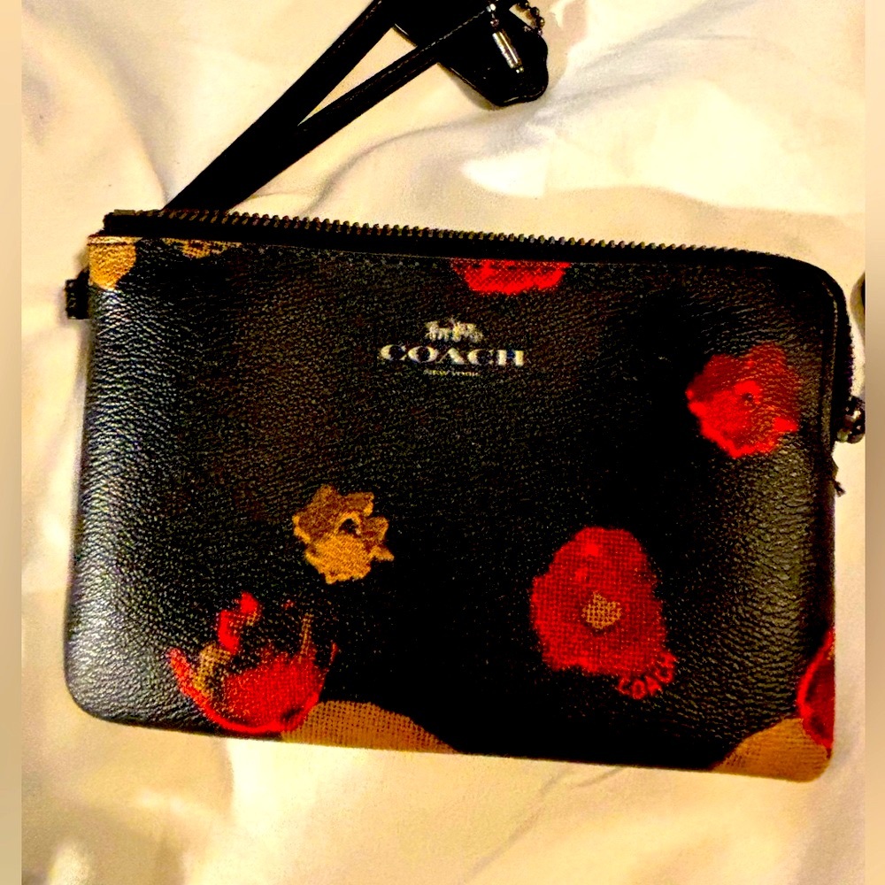 Coach wristlet black with beautiful red roses elegant